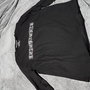 Black long sleeve T. Unintended